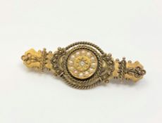 An antique 15ct gold pearl and diamond bar brooch CONDITION REPORT: 4.