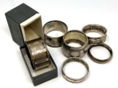 Six silver napkin rings,