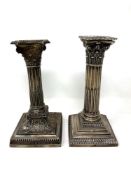 Two Victorian silver Corinthian column candlesticks,