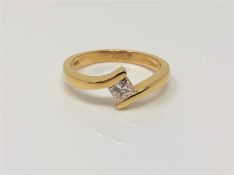 An 18ct gold princess cut solitaire diamond ring, size M CONDITION REPORT: 3.