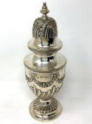 A large ornate silver sugar castor decorated with floral swags, 265g, height 22.5cm.