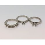 Three vacant platinum ring mounts (3) CONDITION REPORT: 15.