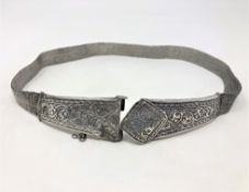 An ornate Indian silver belt CONDITION REPORT: Clasp requiring attention.