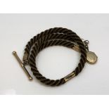 An antique hair Albert chain with gold T-bar, dog-catch and fittings.