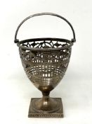 A Georgian silver basket, London marks 1782, height 14.5cm.