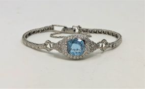 A 14ct white gold aquamarine and diamond bracelet, set with a 3.