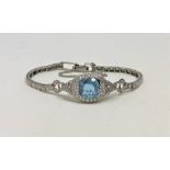 A 14ct white gold aquamarine and diamond bracelet, set with a 3.