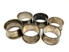 Six assorted silver napkin rings CONDITION REPORT: 90.