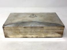 A large Edwardian silver cigarette box of Boer War interest, awarded to Lt. A. G.