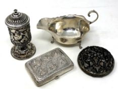 A silver compact, sauce boat,