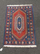 A Persian hearth rug,