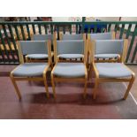 A set of six Danish Magnus Olesen wood framed stacking chairs