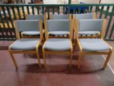 A set of six Danish Magnus Olesen wood framed stacking chairs