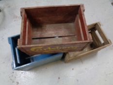 Three vintage brewery crates bearing advertisement