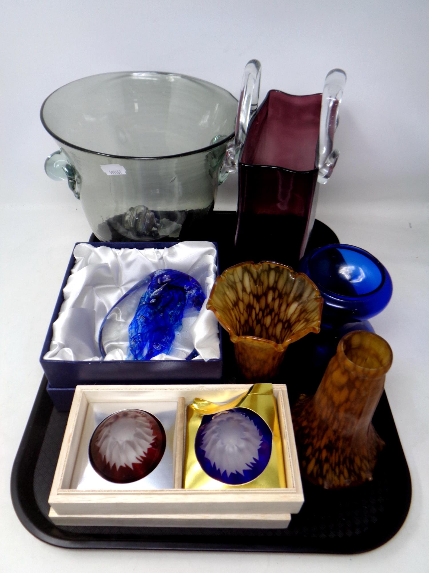 A tray containing assorted glassware to include two tulip light shades, glass handbag, paperweight,