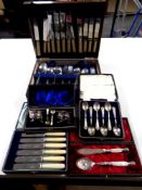 A canteen of assorted chrome and stainless steel cutlery, three cases of knives,