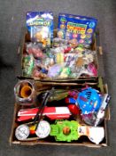 Two boxes containing miscellaneous toys to include micro machine play sets, TNMT vehicles,