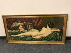 A gilt framed tapestry depicting a reclining nude,