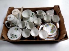 A box containing two tea sets by Woods and Son and Royal Vale