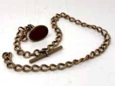 An antique gold plated Albert chain with intaglio carved fob.