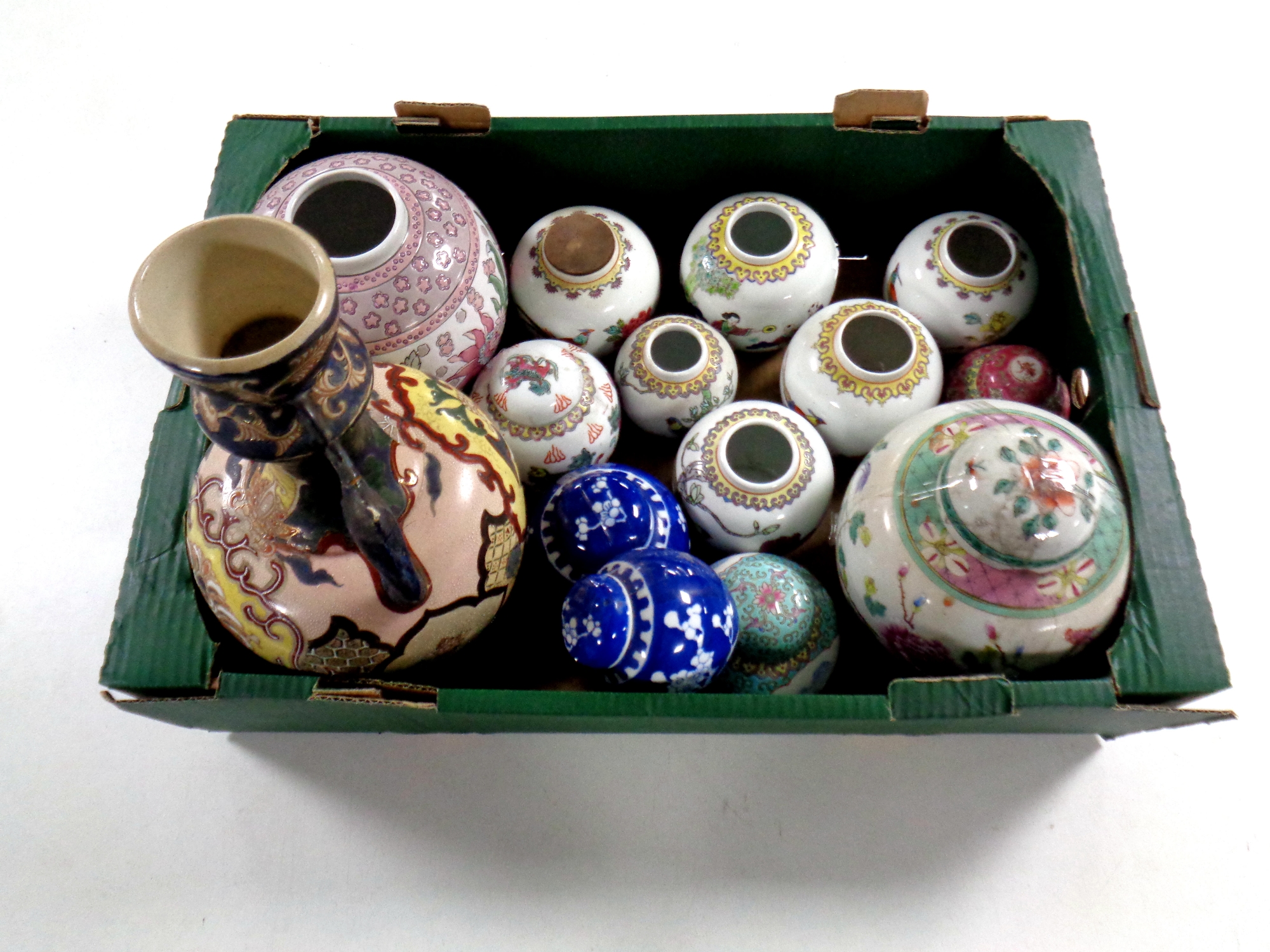 A box containing antique and later oriental ceramics to include twin handled vase,