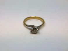 An 18ct yellow gold diamond solitaire ring, the brilliant cut stone approximately 0.3ct, size N.