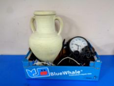 A box containing a contemporary pottery twin handled vase, a station clock on bracket,