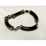 A silver tiger eye bracelet