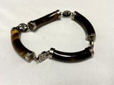 A silver tiger eye bracelet