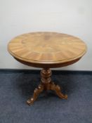 An Italian style pedestal occasional table