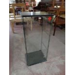 A square glass display cabinet together with a triple dressing table mirror