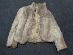 A coney fur jacket by Split End Limited