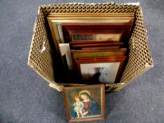 A box containing assorted prints