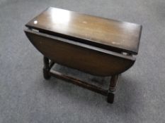 A small drop leaf occasional table