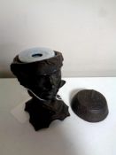 An early 20th century bronze inkwell depicting a man wearing a bow tie and fez