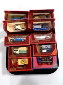A tray containing ten Matchbox Models of Yesteryear die cast delivery vehicles and classic cars,