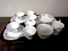 A tray containing a 21 piece Colclough floral patterned bone china tea service