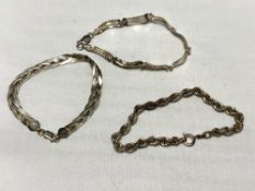 Three silver bracelets