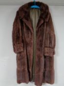 A vintage three quarter length fur coat