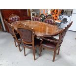 An Italian style shaped pedestal dining table together with a set of six matching chairs,