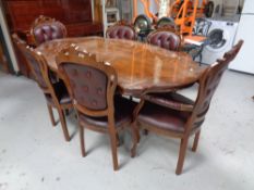 An Italian style shaped pedestal dining table together with a set of six matching chairs,