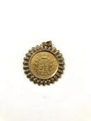 A Victorian sovereign 1862 in 9ct gold mount. CONDITION REPORT: 10.