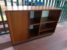 A mid 20th century Danish teak shutter front office cabinet fitted shelves