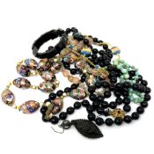A collection beads including jet, rock crystal.