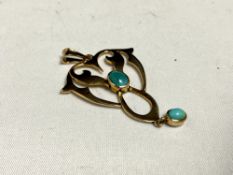 A 9ct gold vintage pendant set with turquoise