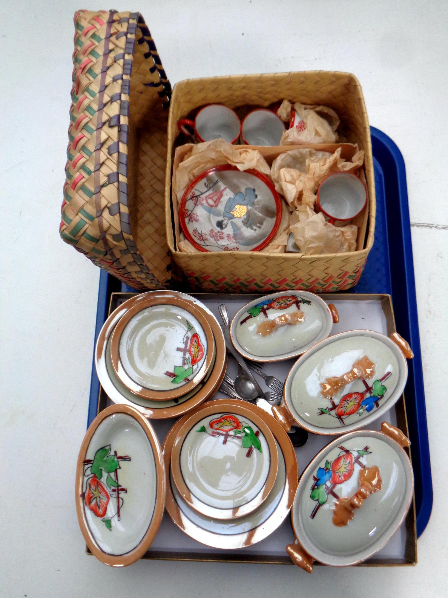 A Japanese eggshell tea service in wicker box together with a miniature Japanese export dinner