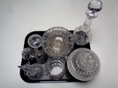 A tray containing assorted antique and later glassware to include paperweights, water jug, decanter,