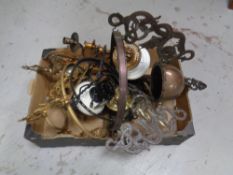 A box containing three continental hanging oil lamps, two with burners, one chimney,