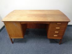 A mid 20th century Danish teak twin pedestal desk