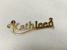A 9ct gold named pendant "Kathleen" 0.5g.
